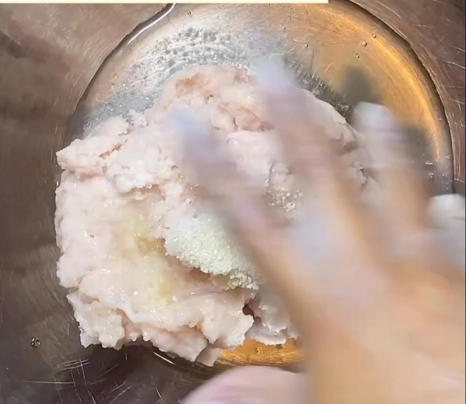 Step 1.1: Mix the fish with salt, sugar, mushroom bouillon, egg white, and cold water until the fish proteins dissolve and the mixture is evenly seasoned