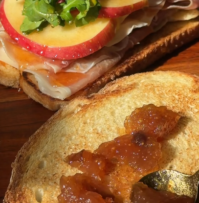 Step 1.1: Remove from the oven and layer on the prosciutto, apple slices, and dressed arugula