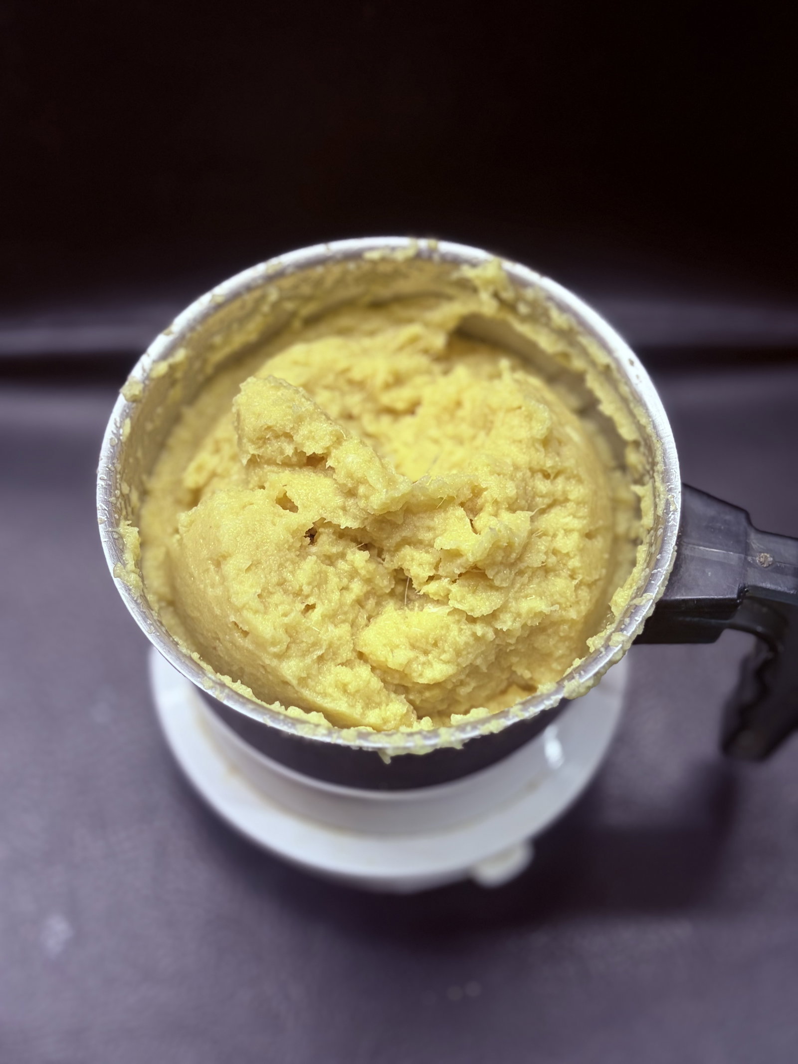 Step 2.1: Add the ginger, garlic, salt, and 2 tbsp oil to a blender