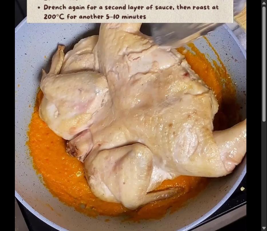 Step 3.1: Drench the chicken with Taliwang sauce and continue roasting breast-side up at 190C for 20 minutes