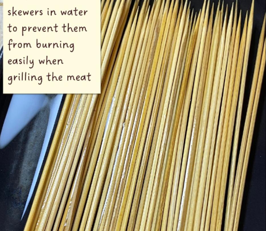 Step 1.1: Soak the bamboo skewers in water to prevent them from burning easily when grilling the meat