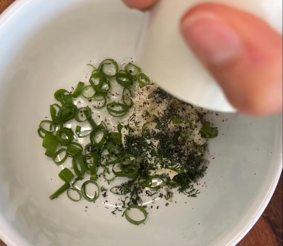 Step 1.1: Mix finely chopped spring onion and dill with cream cheese, lemon juice, salt, and pepper in a bowl
