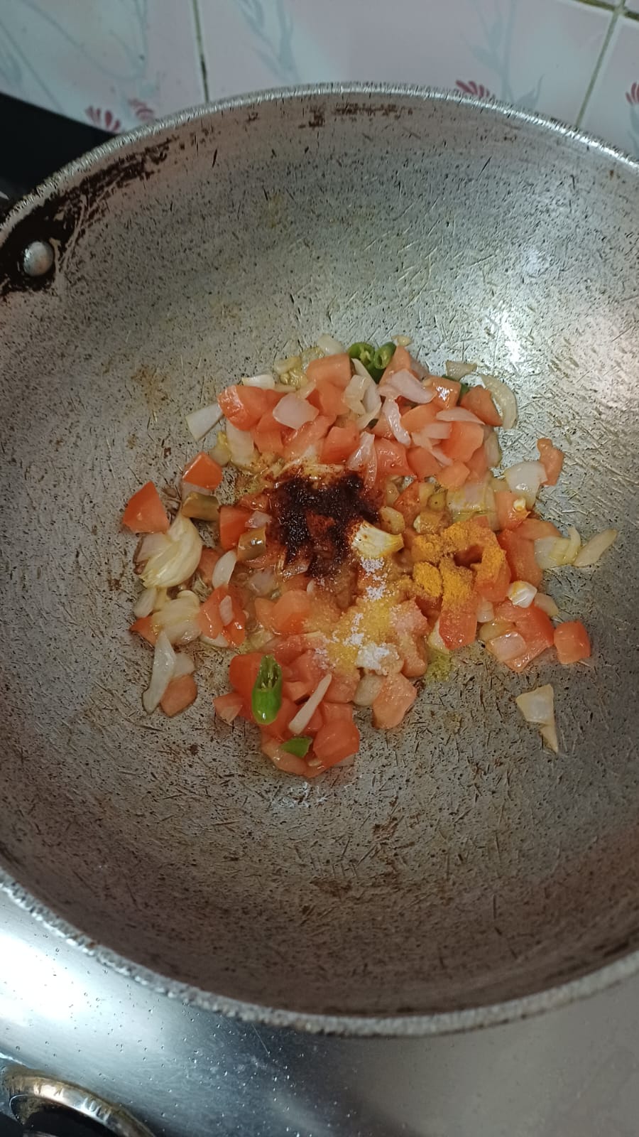 Step 1.1: Add turmeric powder, red chilli powder, and a pinch of salt