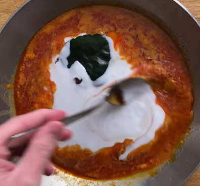 Step 1.1: Add the remaining coconut milk and lime leaf, then cook for an additional 20 minutes, stirring occasionally