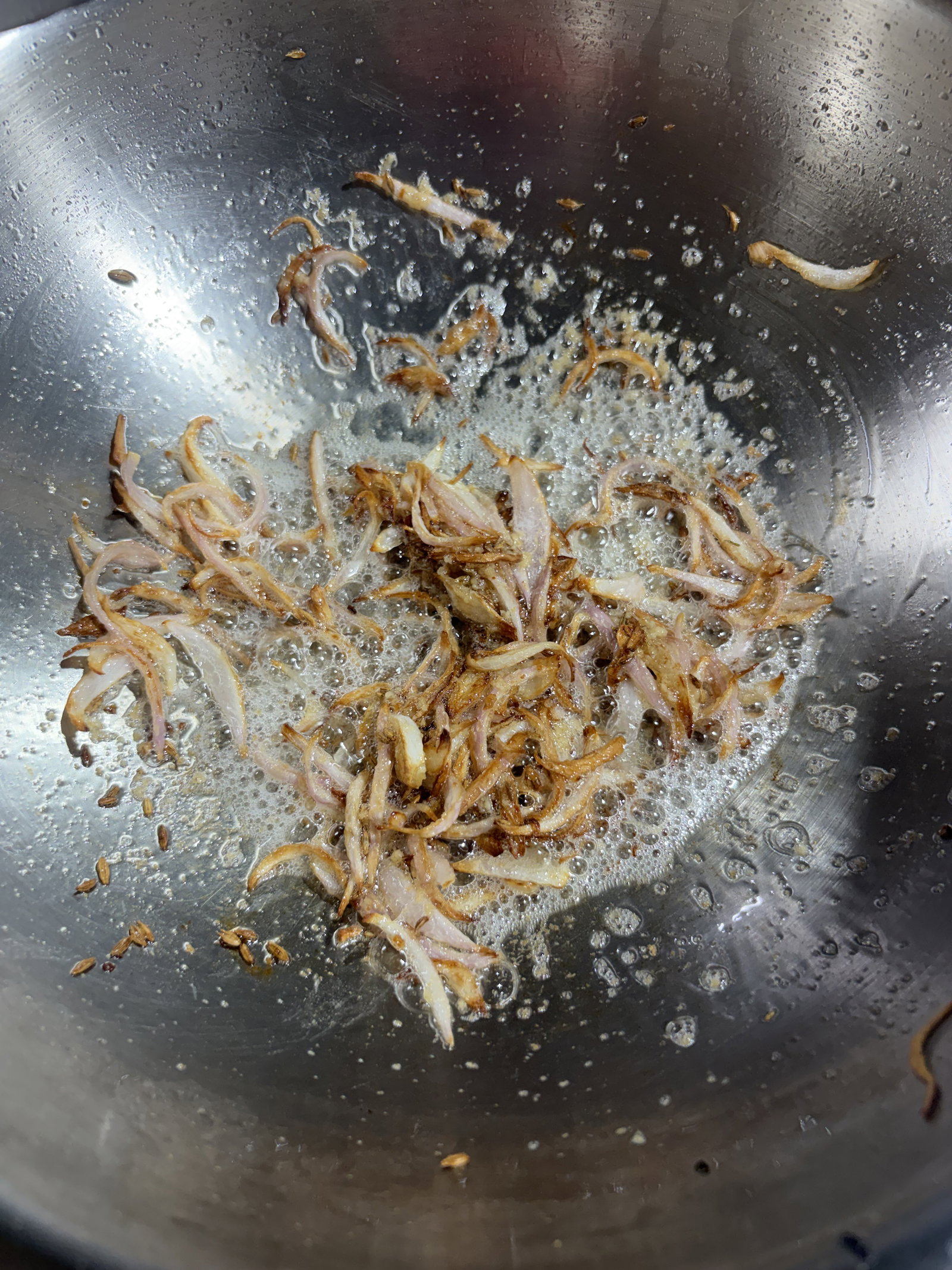Step 2.2: Stir in the ginger-garlic paste and sauté for 30–40 seconds until the rawness disappears