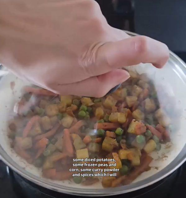 Step 1.1: Add curry powder, garlic replacer or garlic infused olive oil, and onion replacer or green onion tops