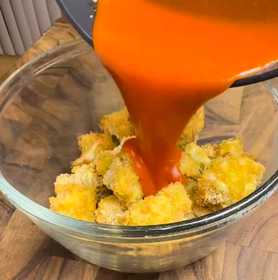 Step 1.1: Transfer the crispy cauliflower to a bowl and toss it in the buffalo sauce