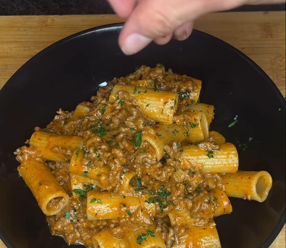 Step 1.1: Serve with more cheese and garnish with chopped parsley