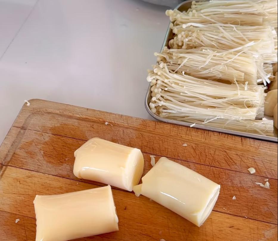 Step 1.1: Trim the base off the enoki mushrooms and wash all the vegetables