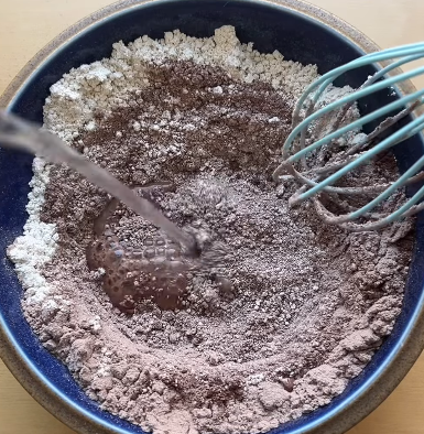 Step 1.1: Mix together oat flour, chocolate protein powder, cocoa powder, baking powder, and water to form the batter