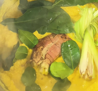 Step 2.1: Heat 2 tbsp oil in a pot and sauté the spice blend and aromatics (bay leaves, galangal, lemongrass, lime leaves) until fragrant