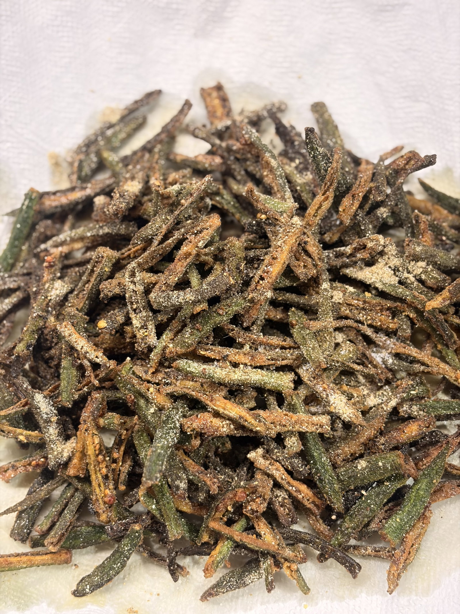 Step 5.1: While still hot, sprinkle the remaining ½ tsp of chaat masala and a pinch of salt