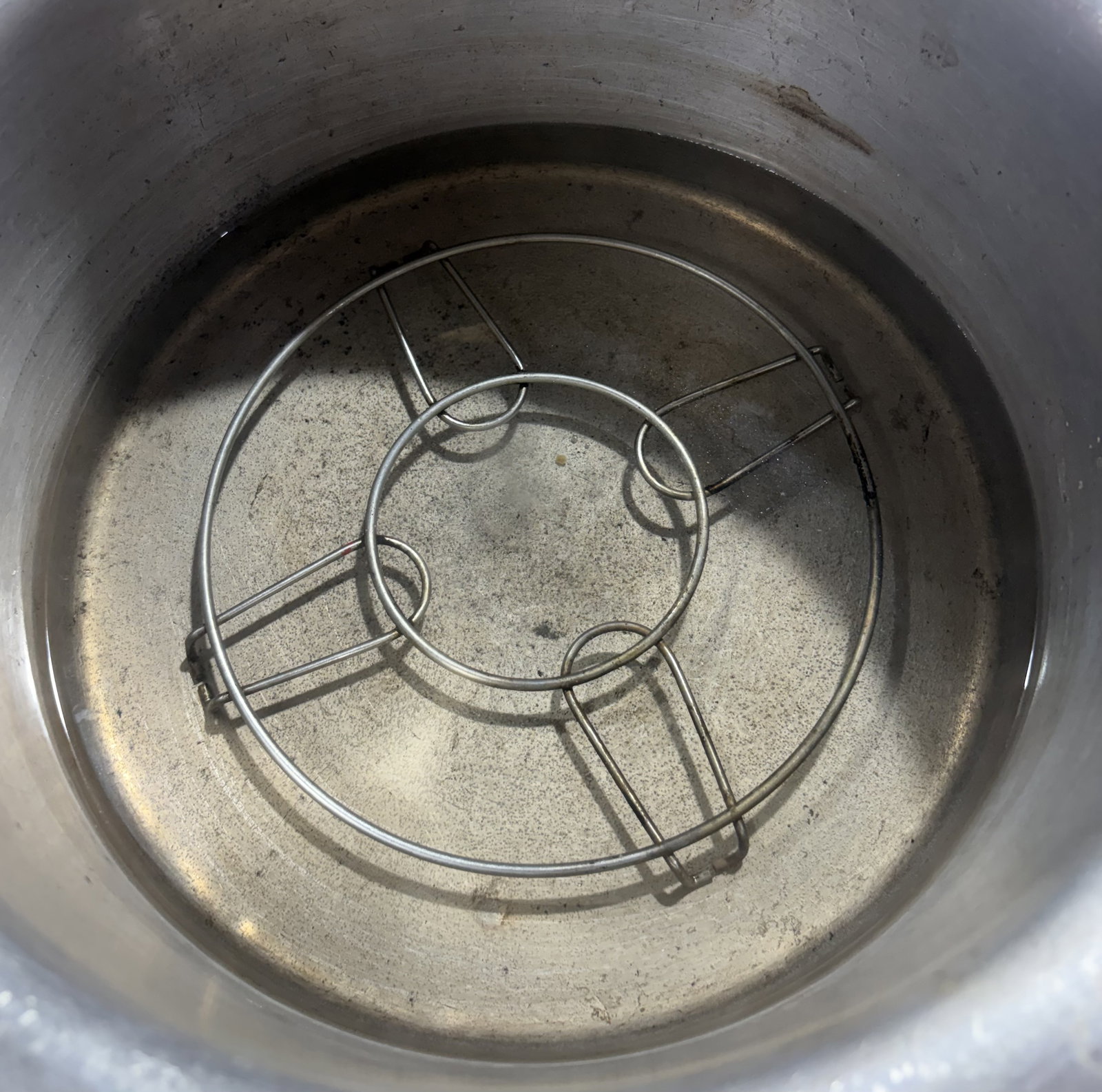 Step 2.1: Bring 4-5 cups of water to a boil in a steamer and place a stand inside