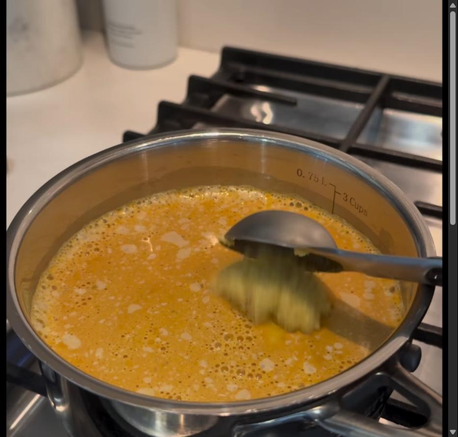 Step 1.1: When the milk simmers, add turmeric, ginger, cinnamon stick, and black pepper