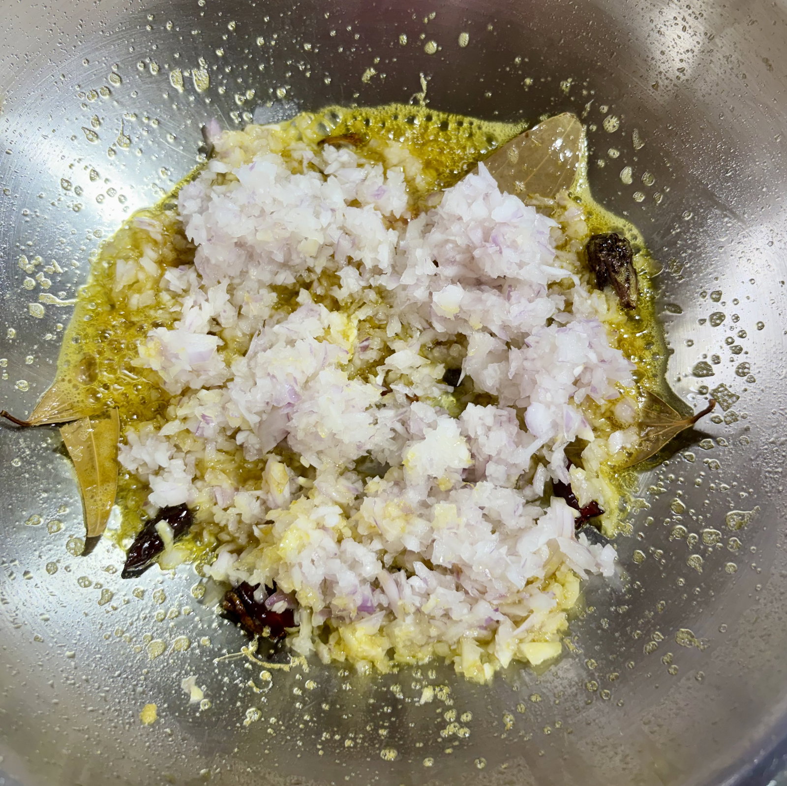 Step 3.1: Add the finely chopped onions to the pan
