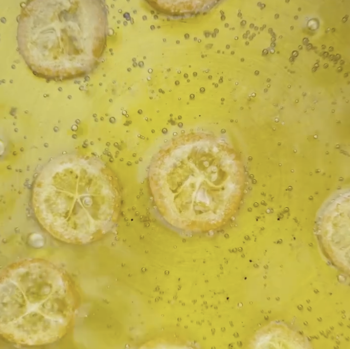 Step 2.1: Confit the kumquats in olive oil at 80°C (176°F) for 7 to 8 minutes