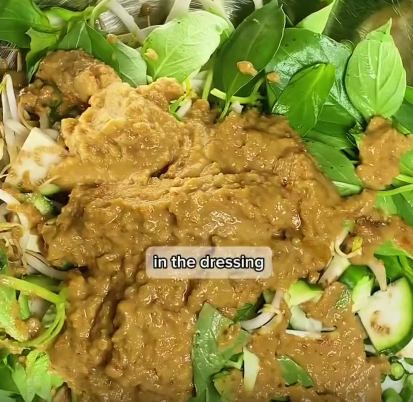 Step 2.1: Pour the peanut sauce over the vegetables and toss until evenly coated