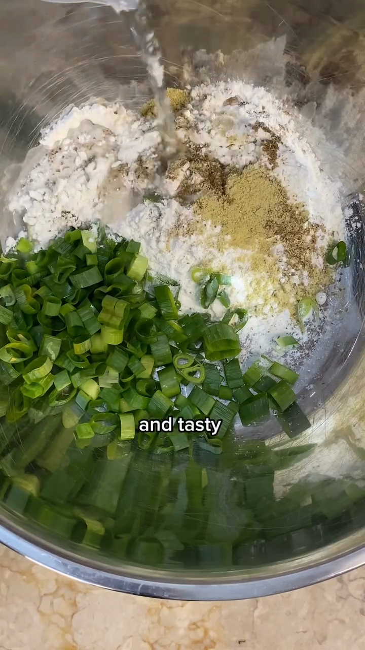 Step 1.1: Mix the sliced green onions into the batter for added flavor