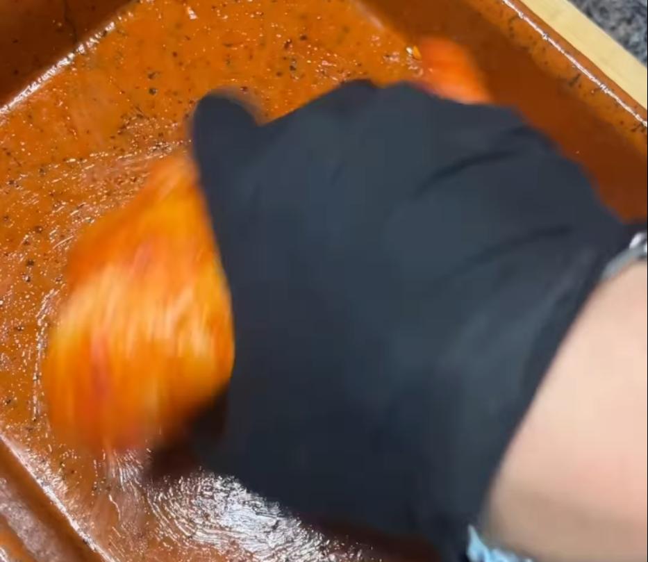 Step 2.1: Add oil and seasoning, mix until chicken is evenly coated