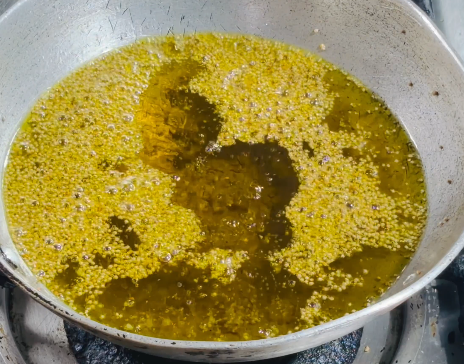 Step 3.1: Add the small mustard seeds and let them crackle