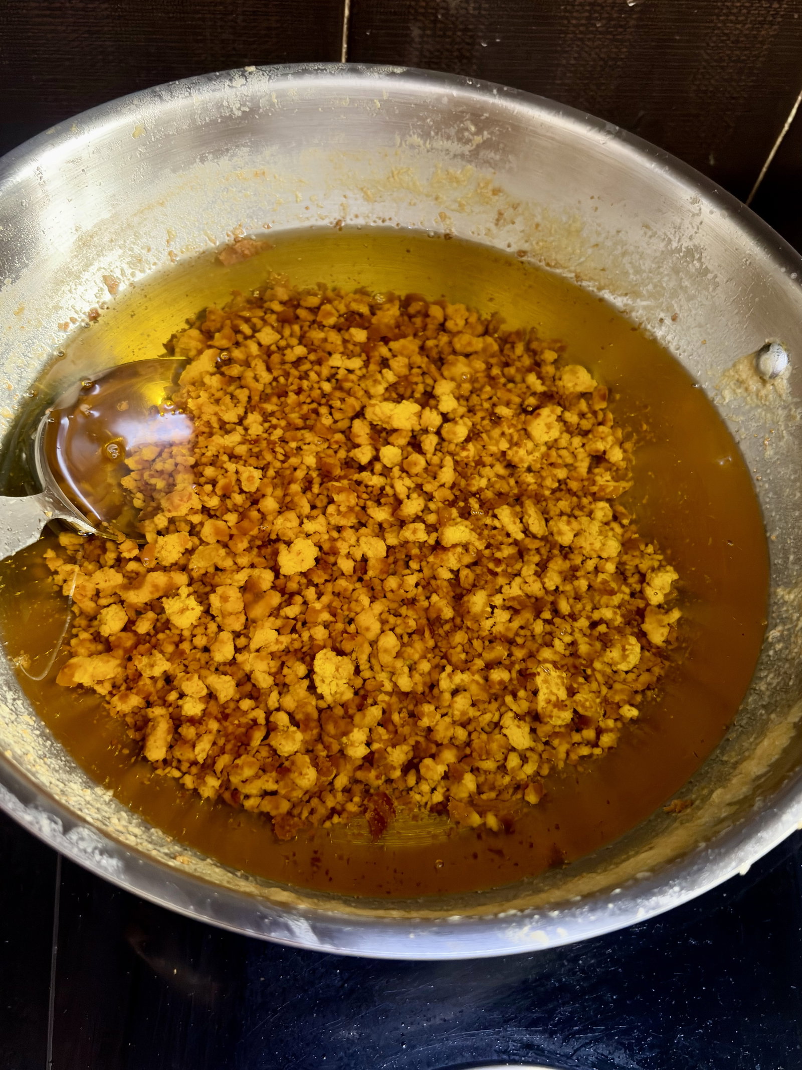 Step 2.2: Cook until the liquid turns completely clear and golden, a rich, nutty aroma develops, and the solids at the bottom turn light golden-brown