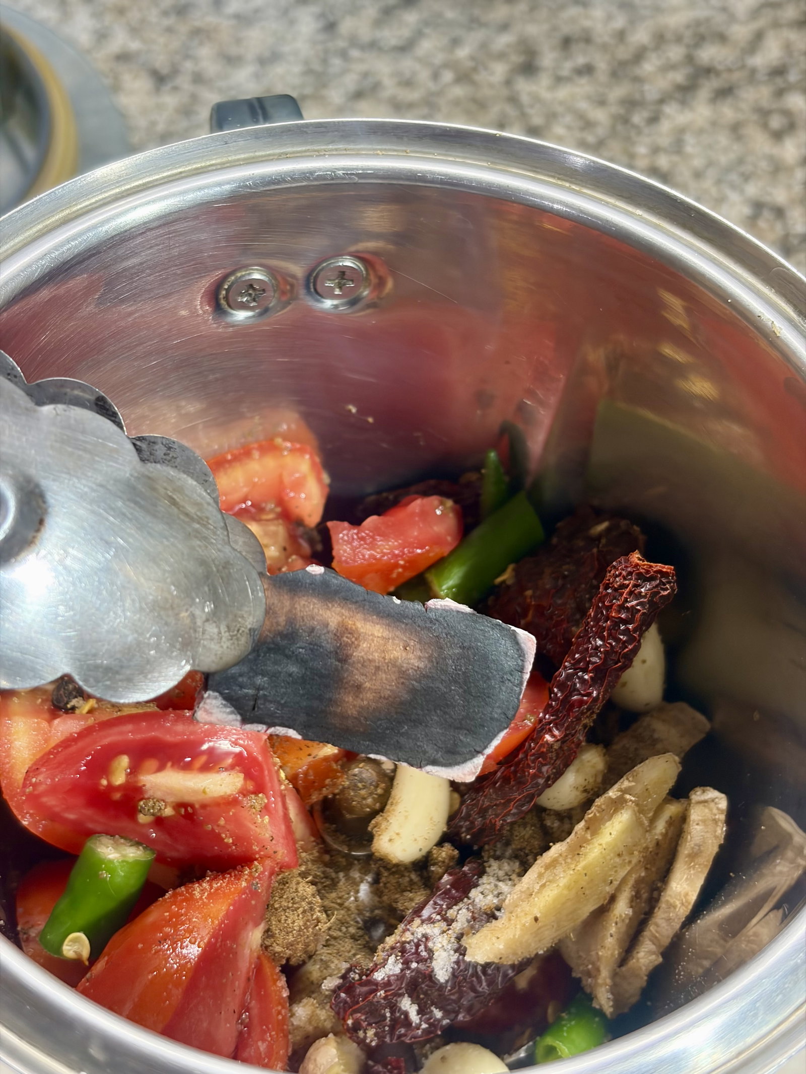 Step 2.1: Blend the charred cinnamon with all the other Masala Paste ingredients until it becomes a smooth, vibrant paste