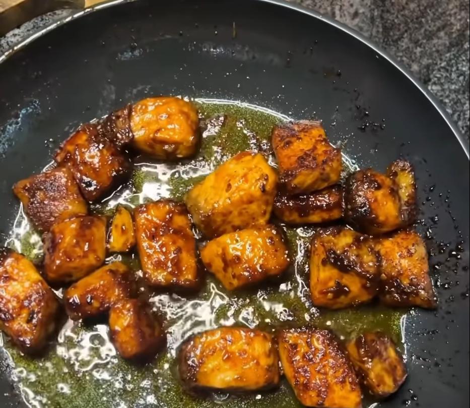 Step 1.1: Add the salmon into the pan and mix for 1-2 minutes so the sauce evenly coats the salmon
