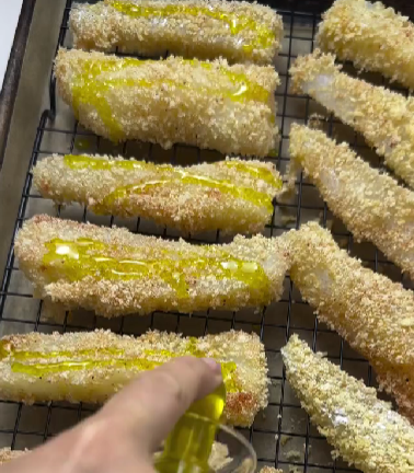 Step 1.1: Arrange the fish sticks on the baking sheet, drizzle lightly with olive oil, and bake for 15–20 minutes, flipping halfway, until golden brown and crispy