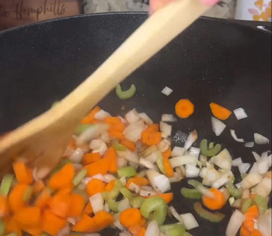 Step 1.1: Add onion, carrots, celery, and garlic to the pan, and sauté until fragrant