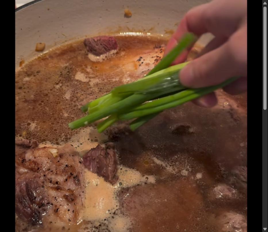 Step 1.1: Place green onions on top of the mixture