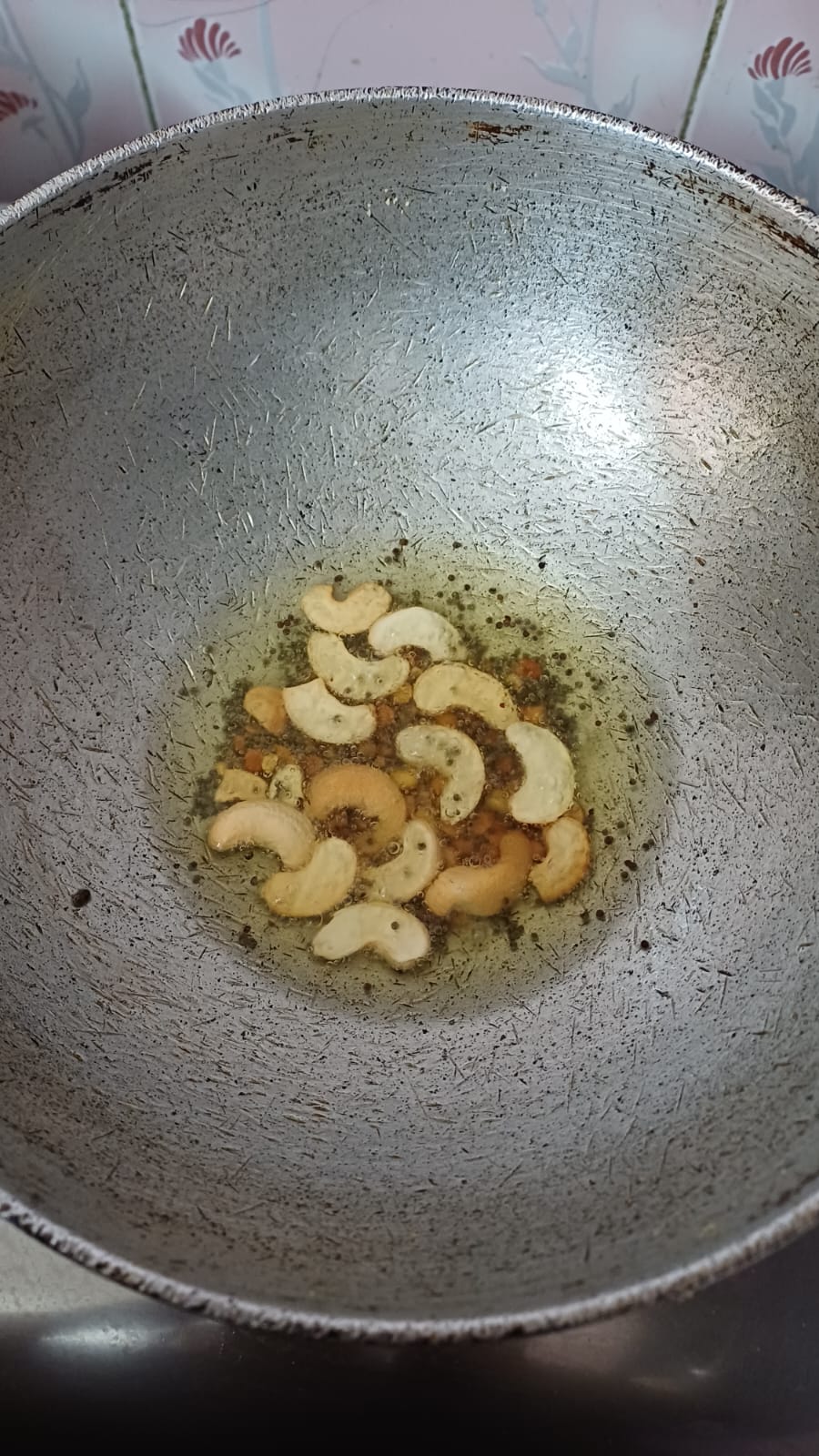 Step 1.1: In the same pan, heat 1 tbsp peanut oil well