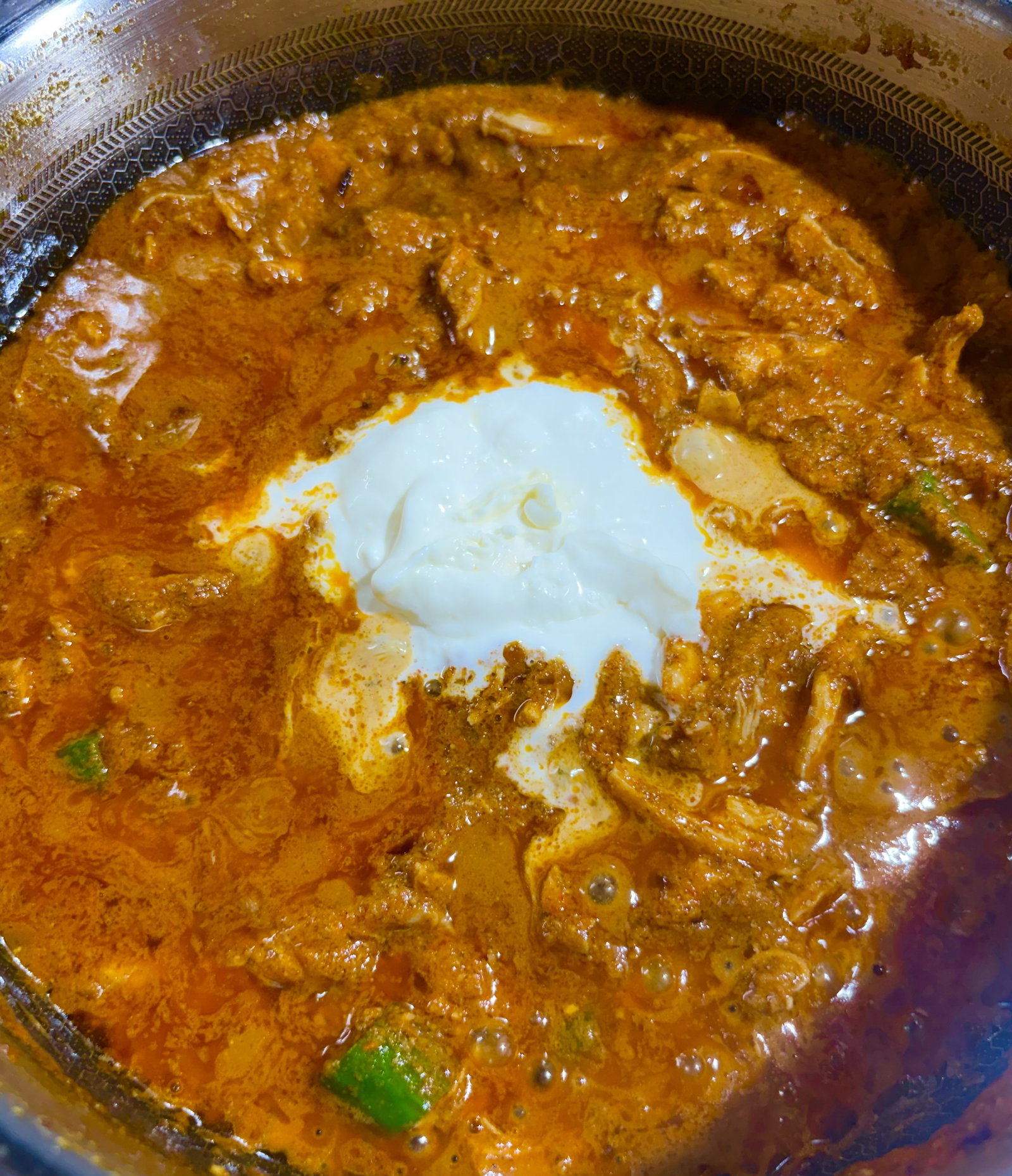 Step 5.1: Reduce heat to low, stir in the fresh cream, and simmer gently for 1–2 minutes