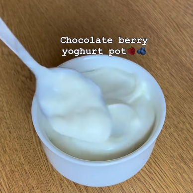 Step 1.1: Add the yoghurt on top of the thawed berries
