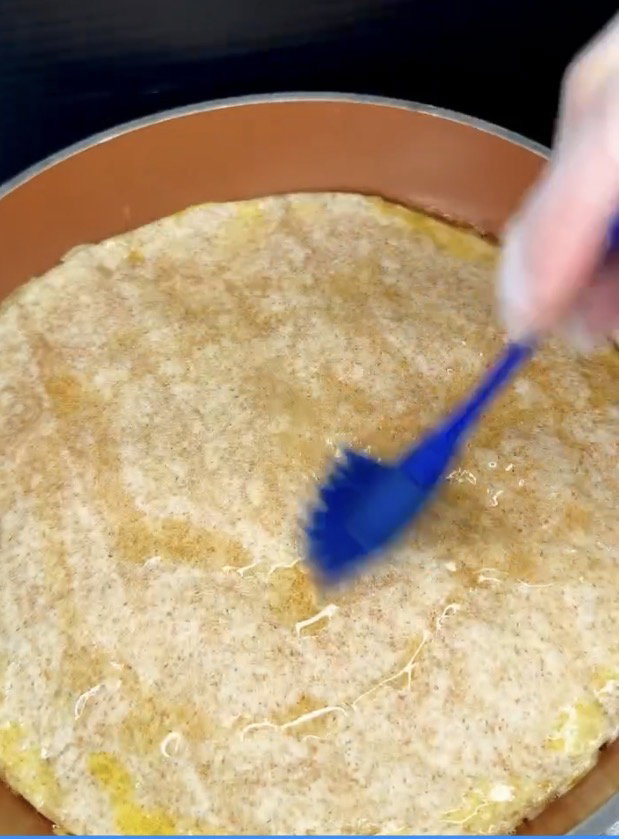 Step 1.2: Brush the top of the tortilla with remaining olive oil