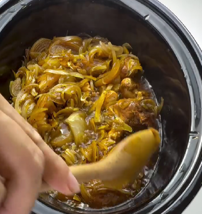 Step 1.1: Shred the chicken directly in the crockpot using a spoon