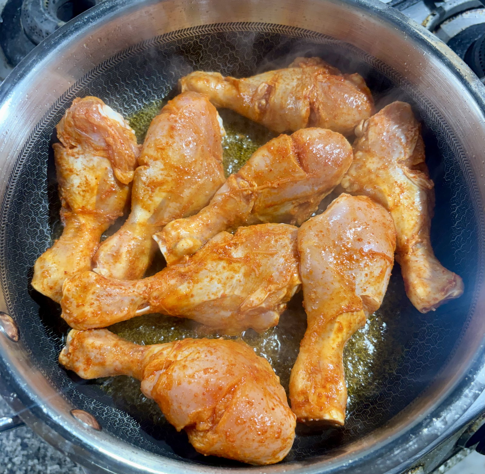 Step 3.1: Heat the ghee in a wide, heavy-bottomed pan over medium-high heat