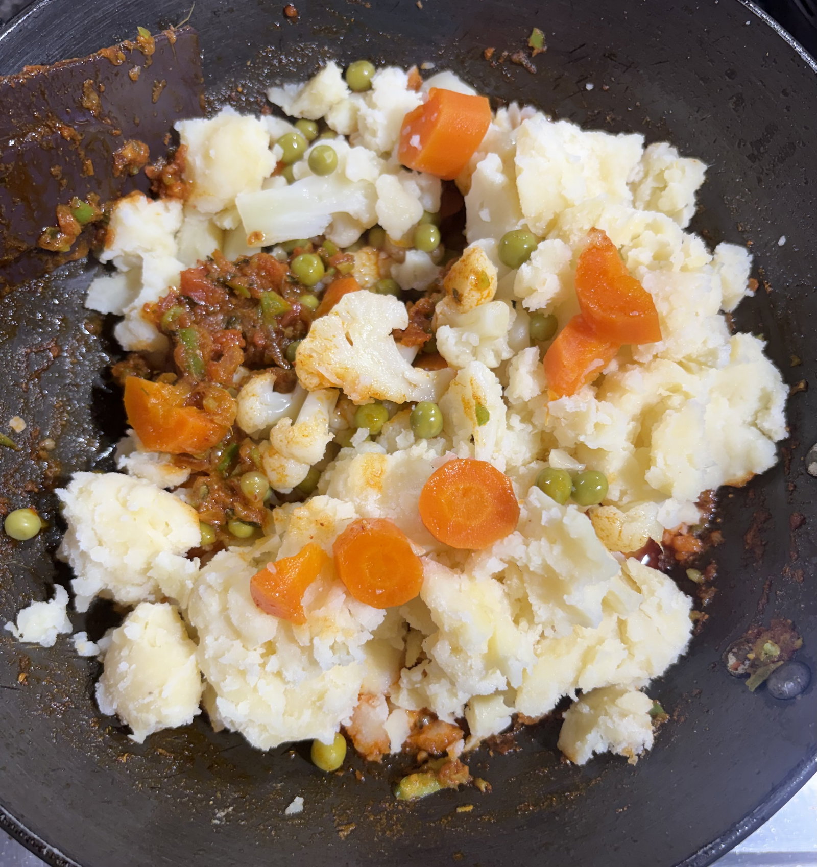 Step 2.1: Add boiled potatoes and the cooked vegetables