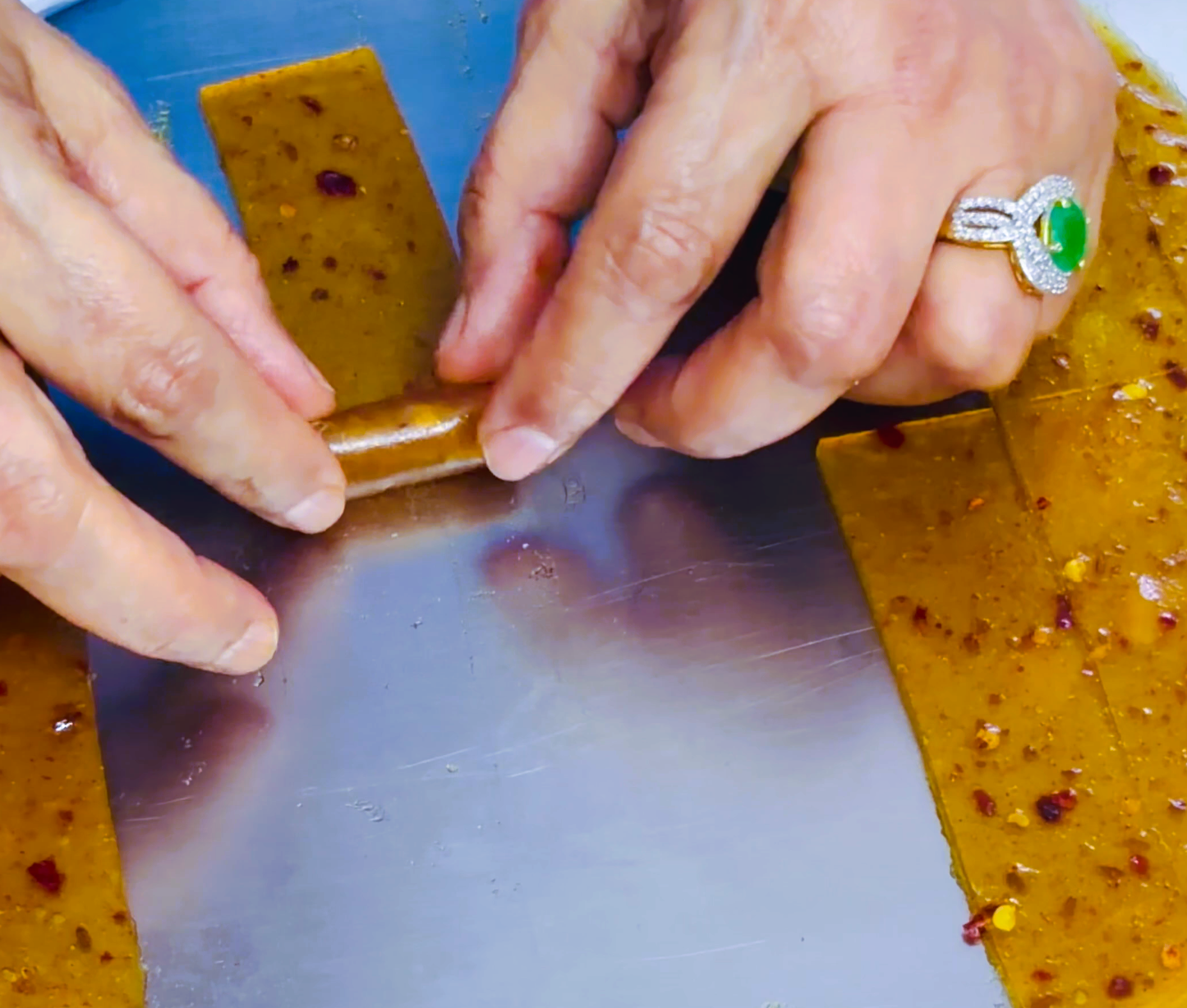 Step 5.2: Transfer the mango sheet onto a clean board or to the back of the thali