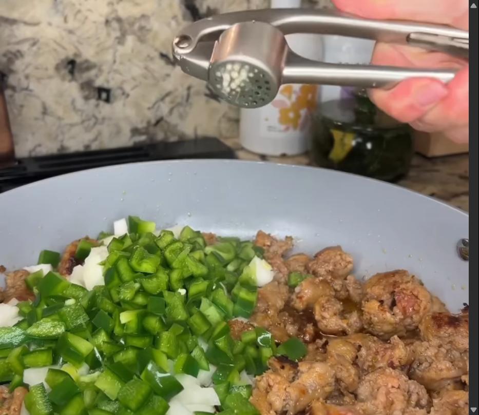 Step 1.1: Add onion, green bell pepper, and garlic to the pan, and sauté until fragrant