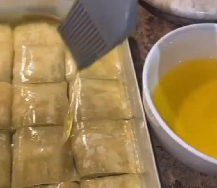 Step 1.1: Slice the baklava into equal pieces and pour over the remaining ghee mixture