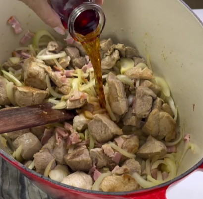 Step 1.1: Pour in the Marsala wine, scraping up the caramelized bits at the bottom of the pot