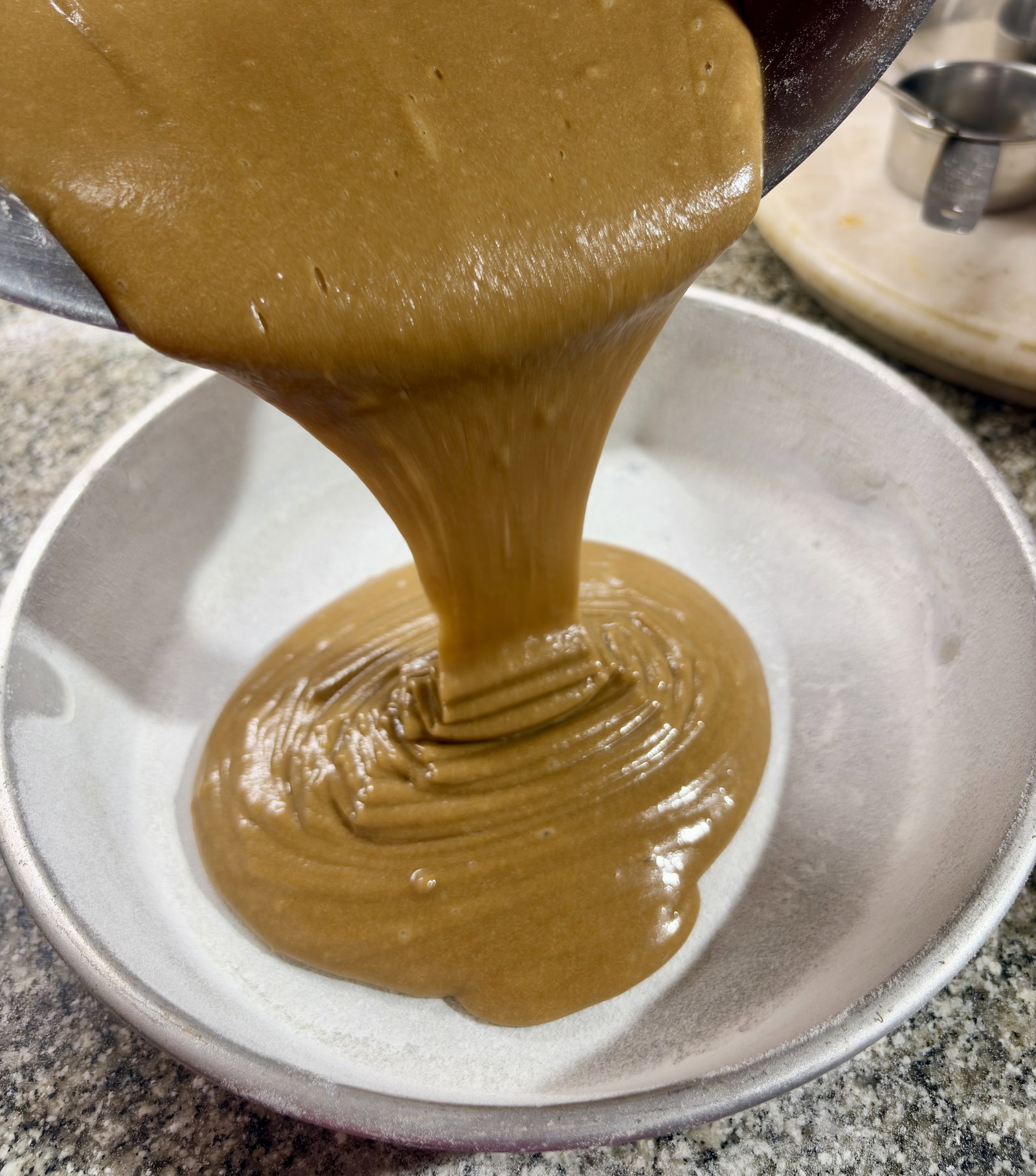 Step 3.1: Pour the smooth batter into the prepared tin and tap it 2–3 times on the counter to release trapped air bubbles