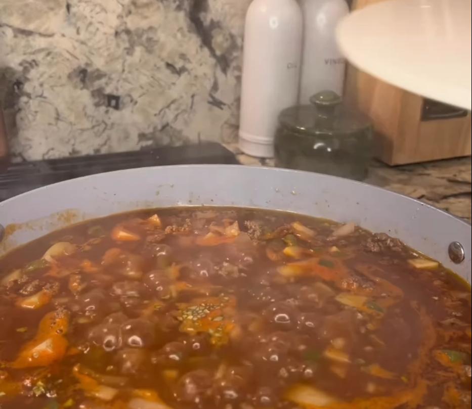 Step 1.1: Cover with a lid, lower heat to medium, and simmer for 15 minutes