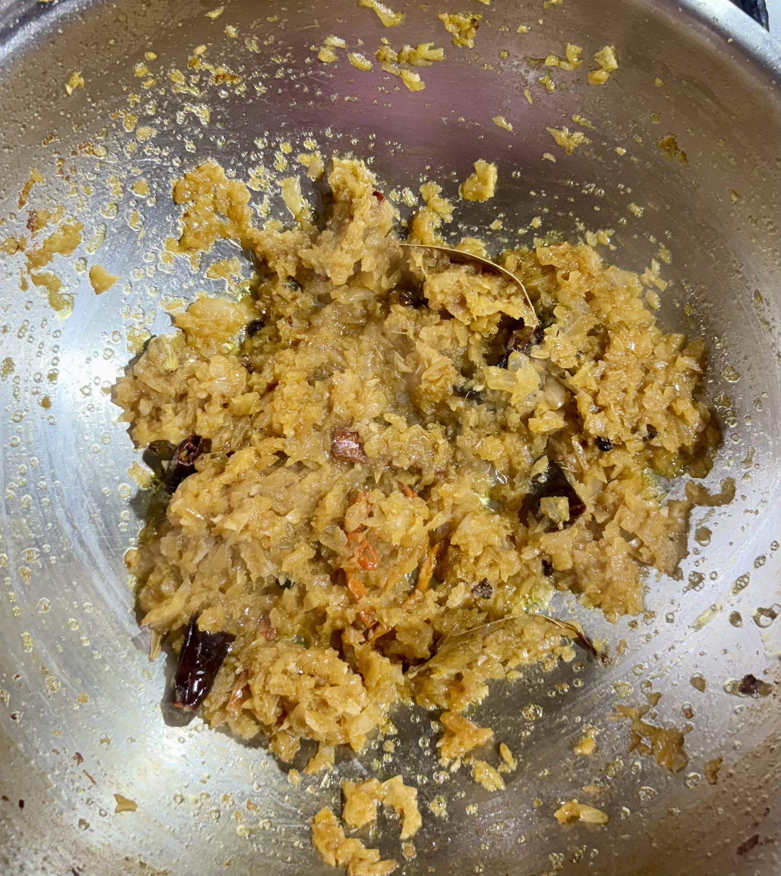 Step 3.2: Add the finely chopped onions to the pan