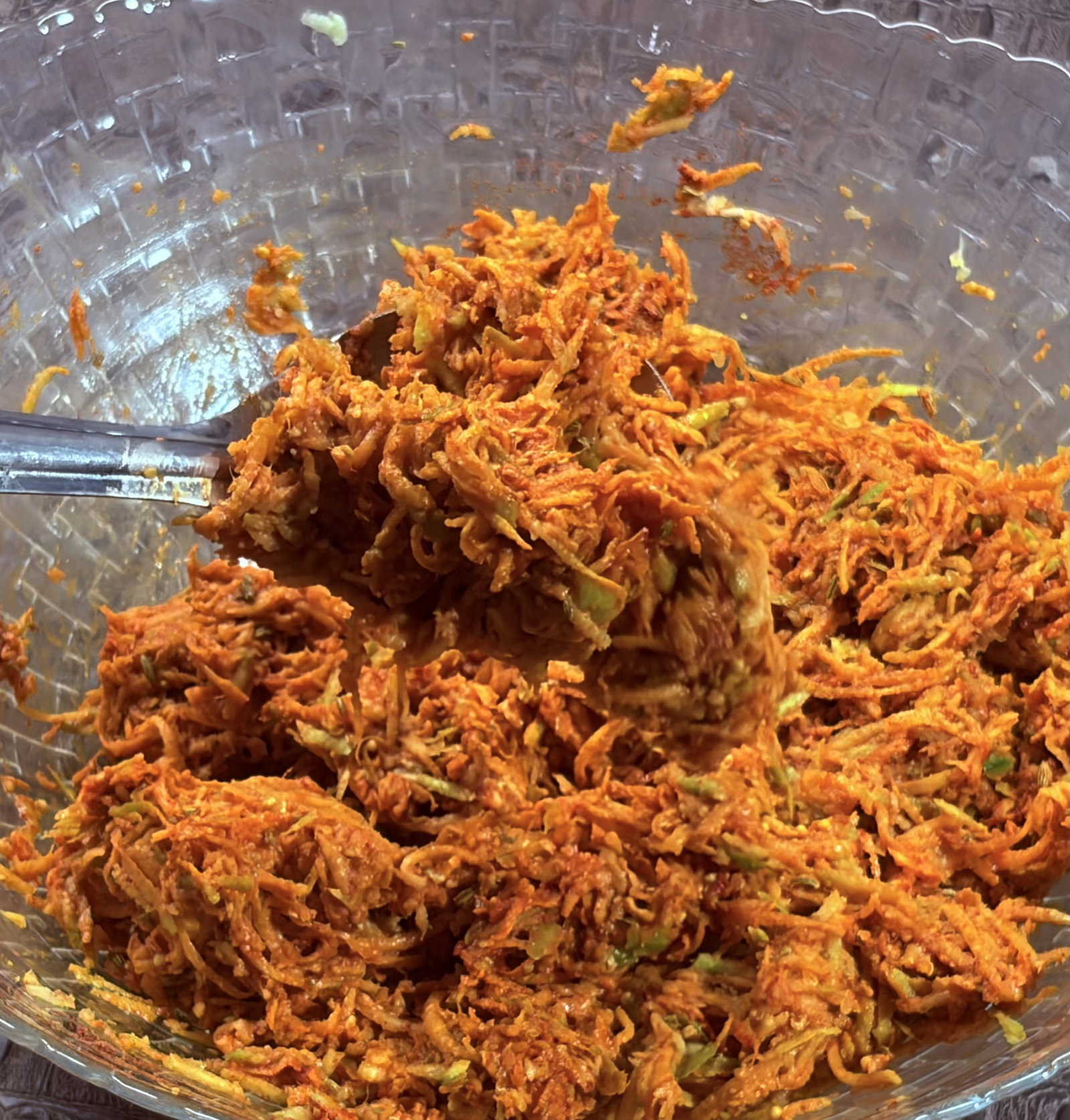 Step 2.1: Toss and mix everything well until the mango strands are evenly coated with the spices