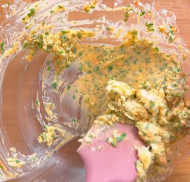 Step 3.1: Gradually add the juice of 1/2 lemon along with the zest, then roll the butter in cling film and chill in the fridge until firm