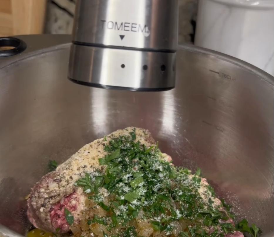 Step 1.1: In a large mixing bowl, combine ground pork, ground beef, egg, breadcrumbs, sautéed onions and garlic, parsley, salt, and pepper