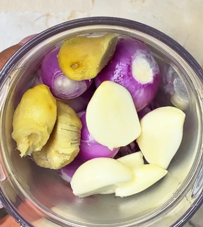 Step 2.1: Blend the shallots, garlic, and ginger into a smooth paste