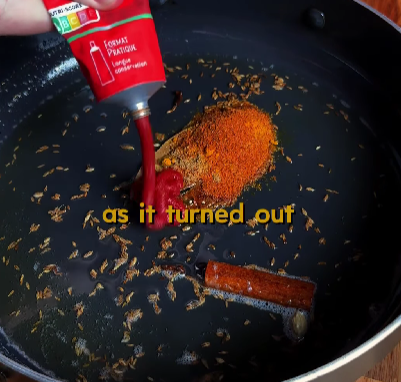 Step 2.1: Stir in the tomato puree and cook for another 2 minutes
