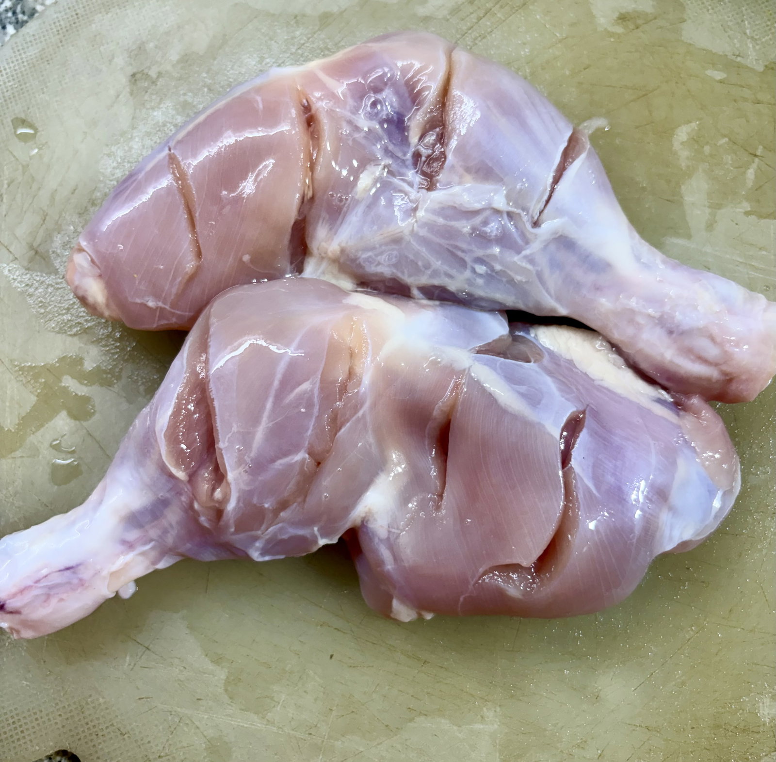 Step 1.1: Pat the chicken quarters completely dry and rub the marinade all over, ensuring it gets deep into the slits